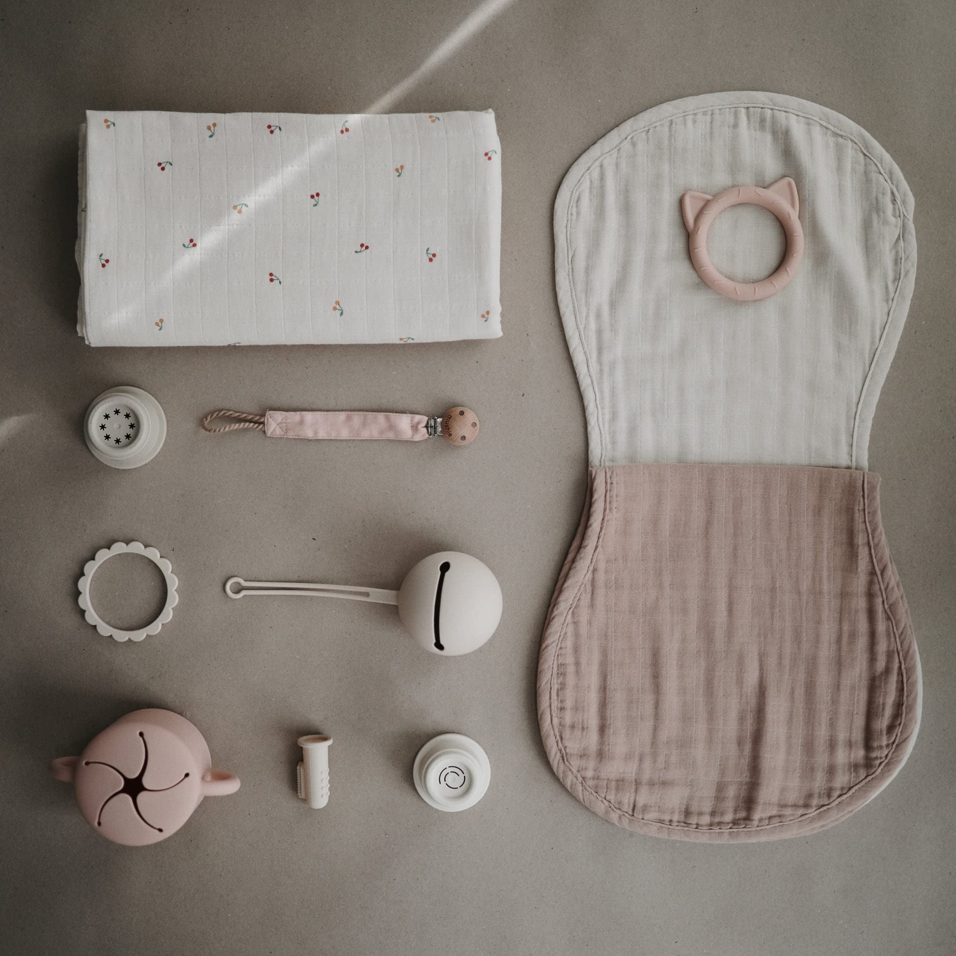 Mushie organic cotton burp cloths washed demo shows soft texture after multiple washes
