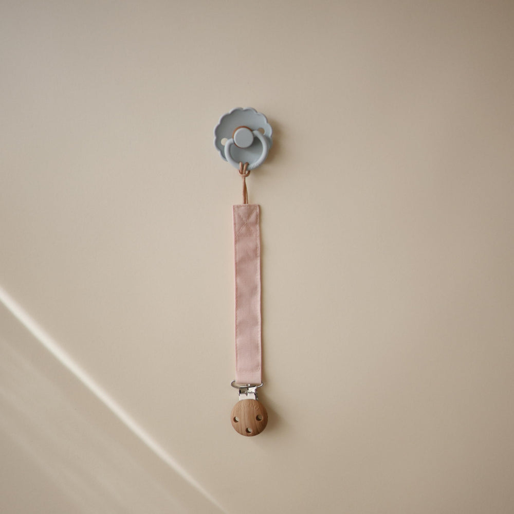 Mushie linen pacifier clip faux-wood silicone clasp secures pacifier safely