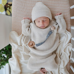Mushie Pacifier Clip water-resistant coating emphasizes daily resilience