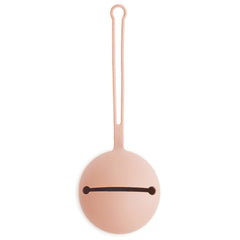 Mushie pacifier holder case in blush shows clean, accessible storage for pacifiers on the go.