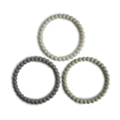 Mushie Pearl Teether Bracelet green tea beads close-up for soothing gums during playtime