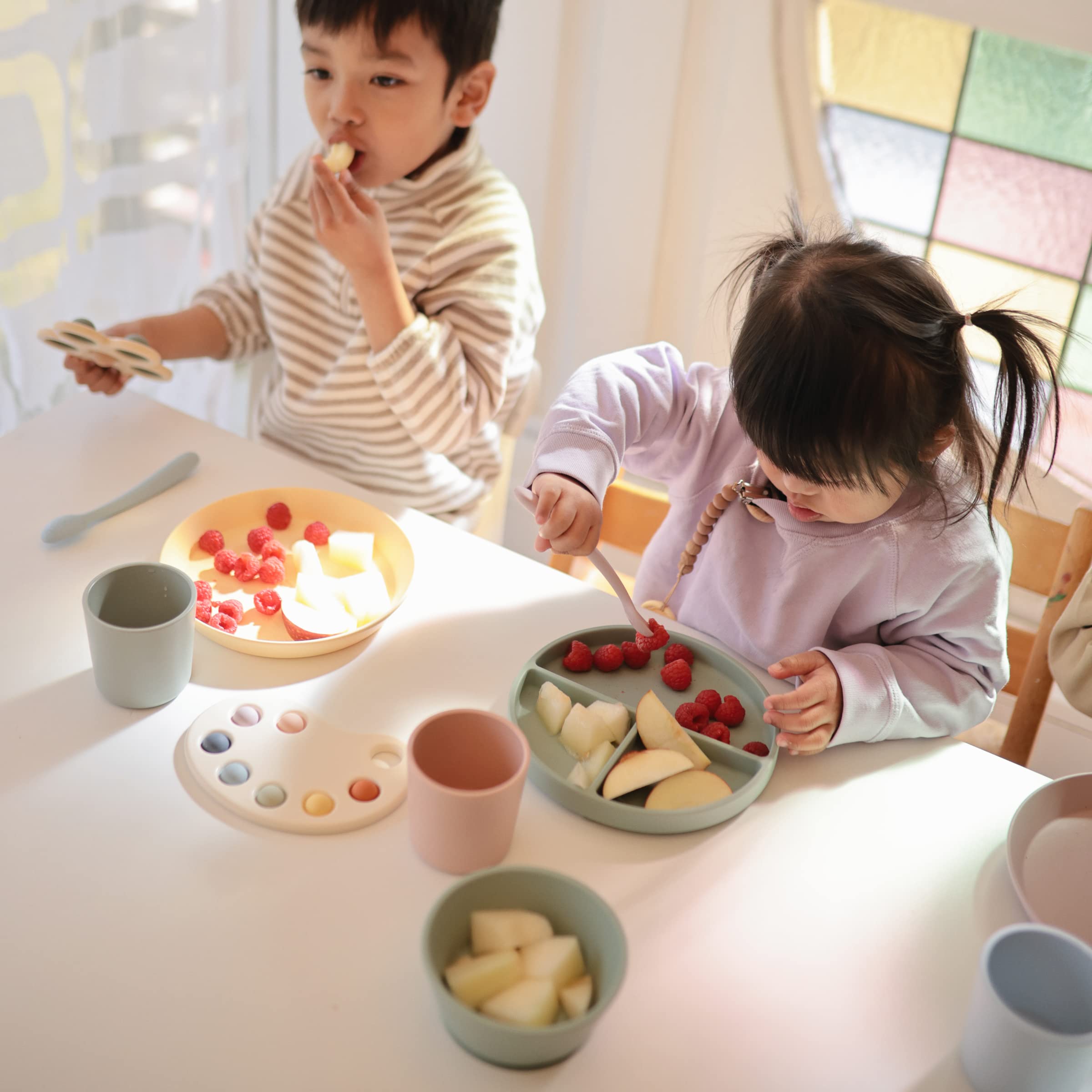 Powder blue Mushie spoon color option for engaging mealtime