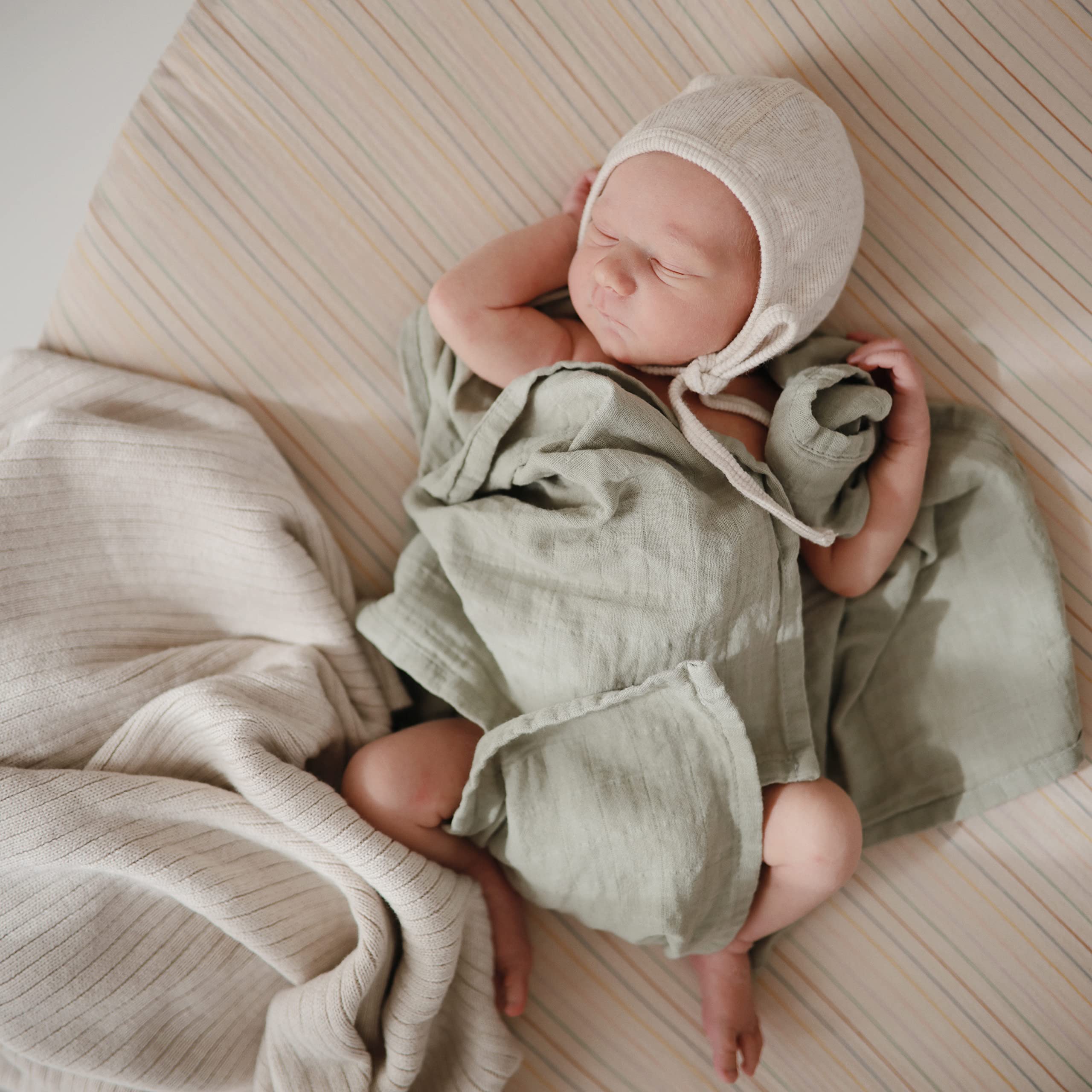 Mushie retro-stripes design adds gentle color to your nursery