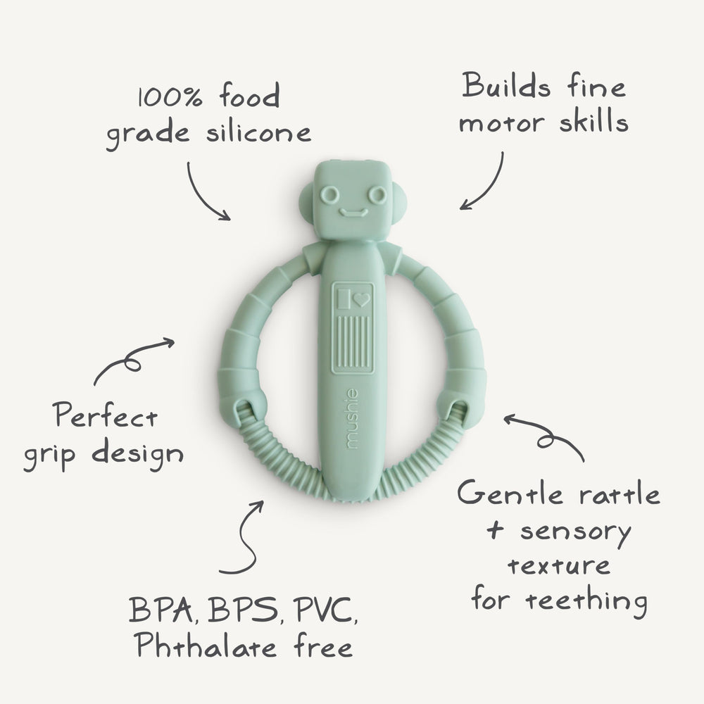 Mushie robot rattle teether packaging display highlights design and safety features