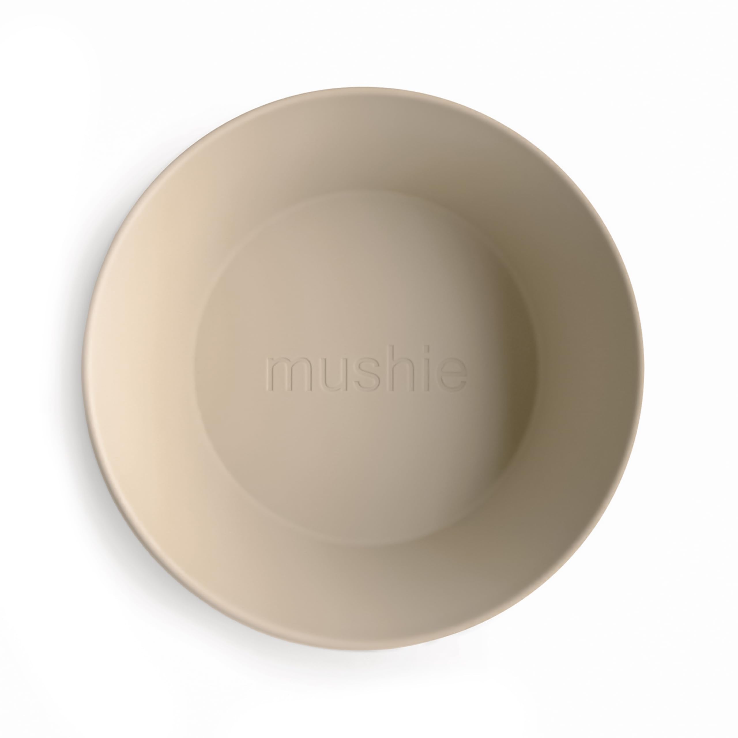 Mushie round dinnerware bowls vanilla, shown in a calm dining setup for kids.
