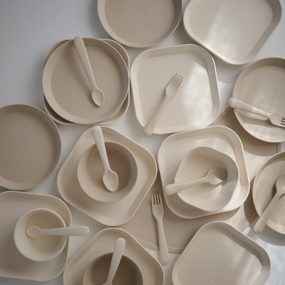 Mushie vanilla round bowls, 5x5 inches for toddler portions.
