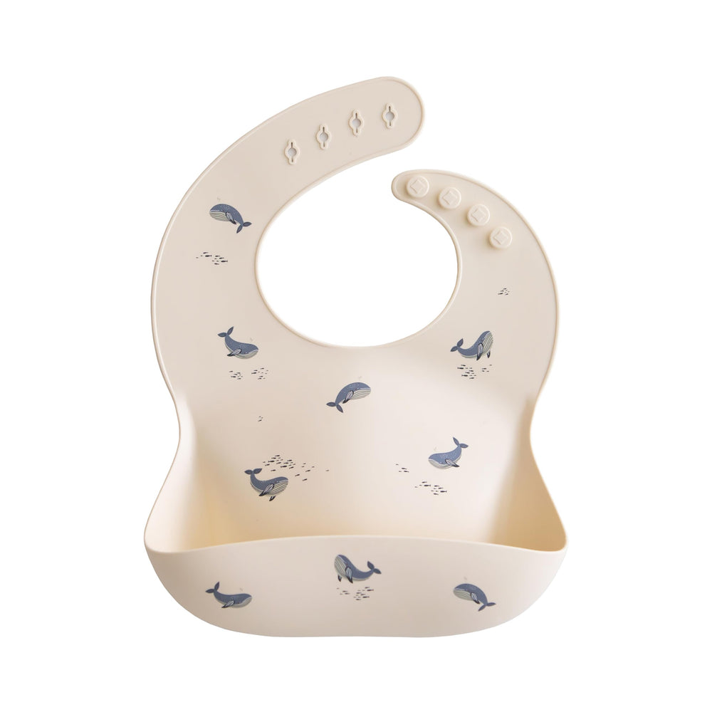 Mushie silicone baby bib adjustable-neck shows a snug fit for growing babies during meals