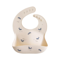Mushie silicone baby bib adjustable-neck shows a snug fit for growing babies during meals