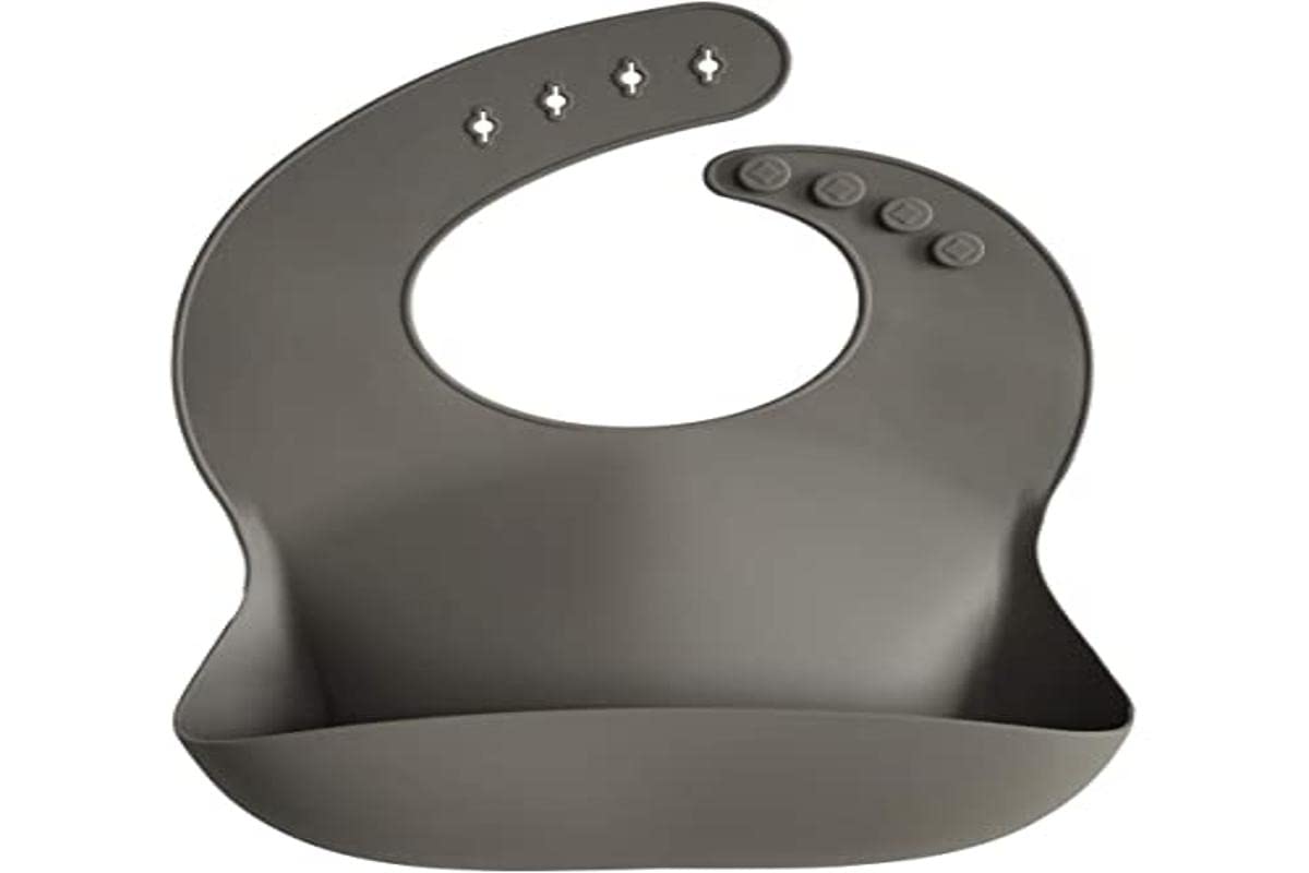 Mushie silicone baby bib easy clean resists stains for quick post-meal cleanup.