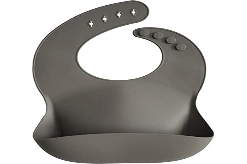 Mushie silicone baby bib easy clean resists stains for quick post-meal cleanup.
