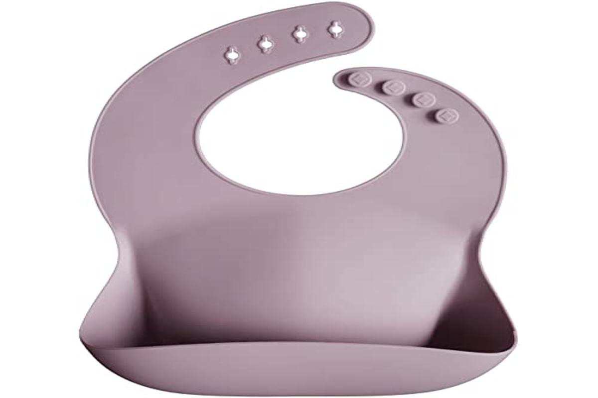 Mushie silicone bib features stain-resistant surface for quick cleanup