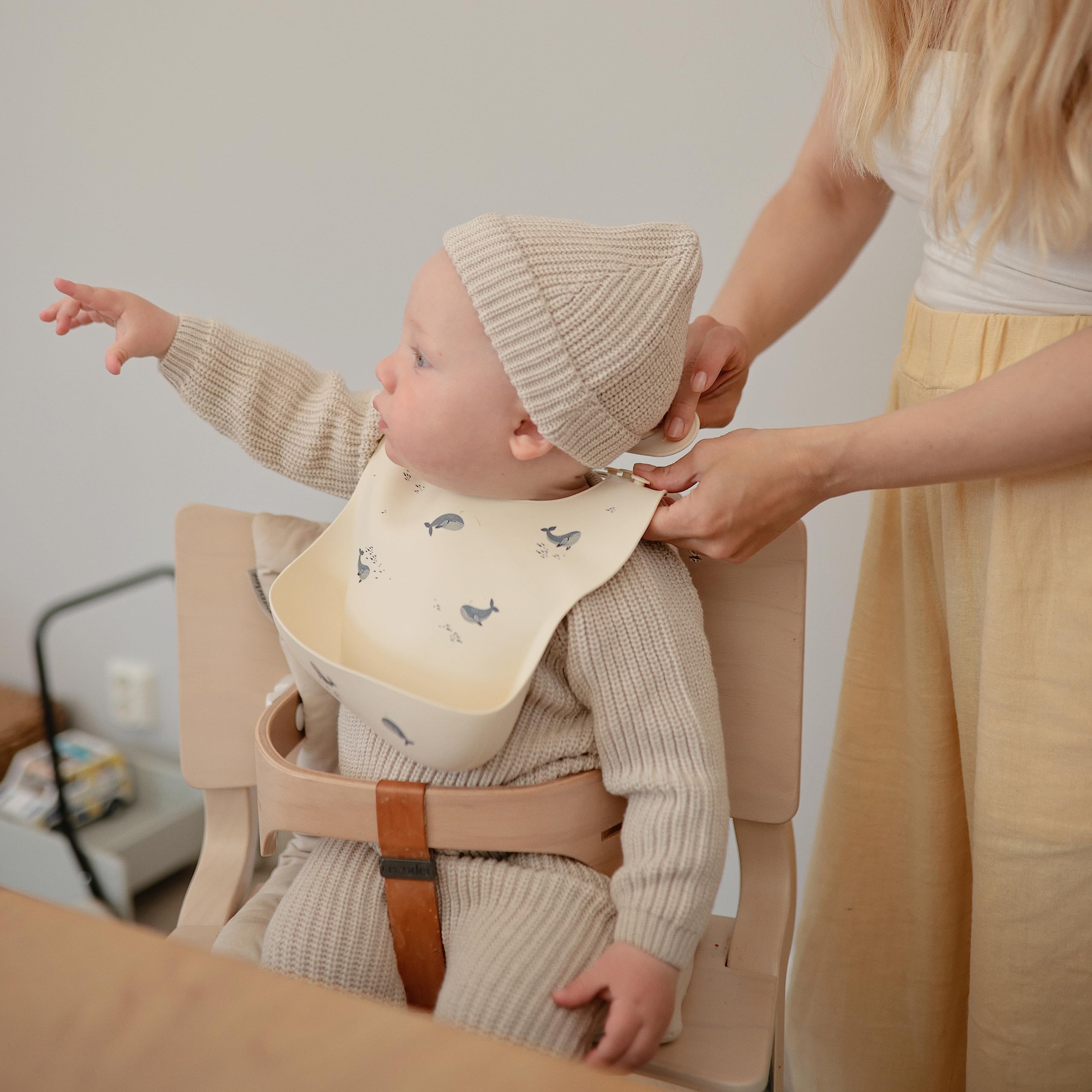 Mushie silicone baby bib Sweden-design reflects timeless style during meals
