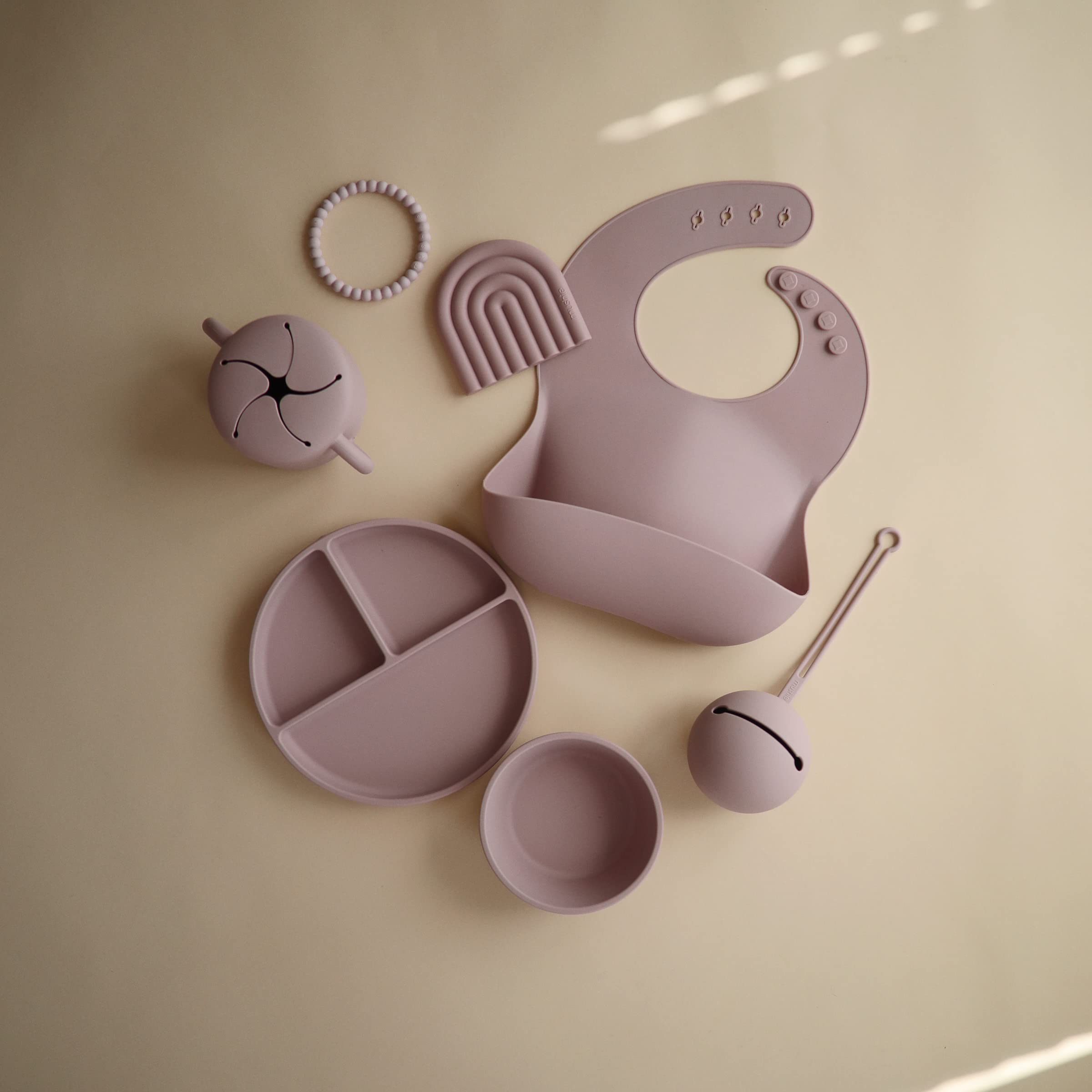Mushie silicone bib material is waterproof and easy to wipe clean