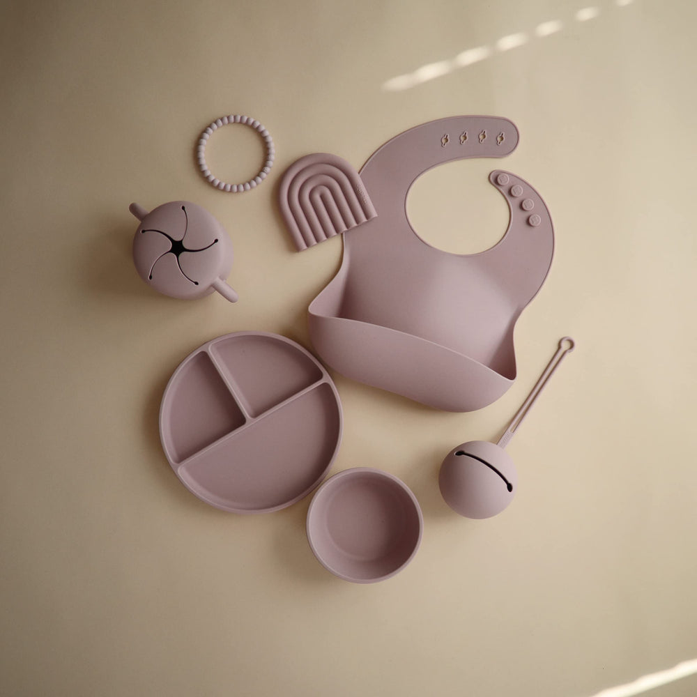 Mushie silicone bib material is waterproof and easy to wipe clean