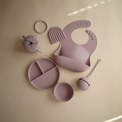 Mushie silicone bib material is waterproof and easy to wipe clean