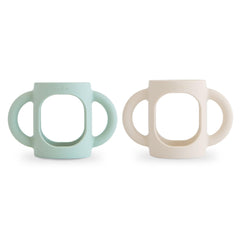 Mushie silicone baby bottle handles in Cambridge Blue offer easy gripping for little hands.