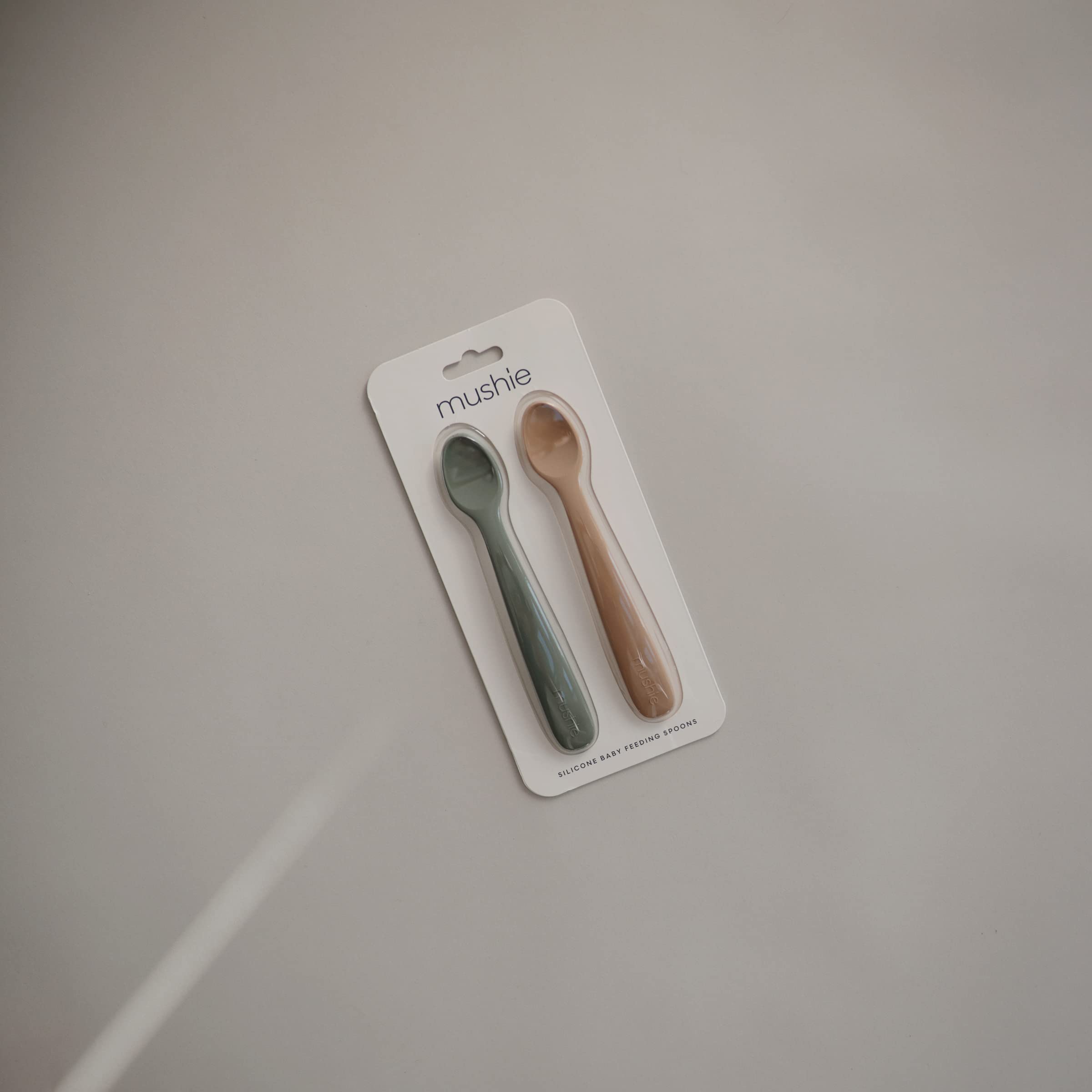 Mushie dried thyme spoon adds soothing color to mealtime.