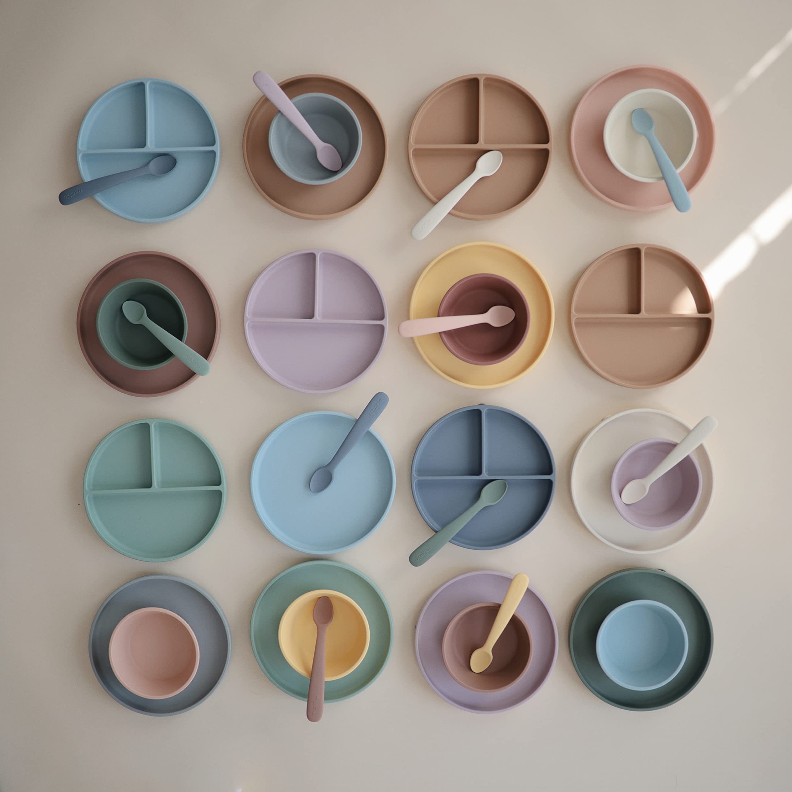 Mushie silicone spoons reduce mess during meals