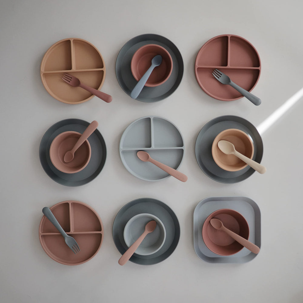 Cleaning is simple with warm water and soap for Mushie feeding spoons.