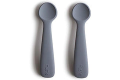 Colorful Mushie Tradewinds spoons make feeding intervals more engaging for babies.