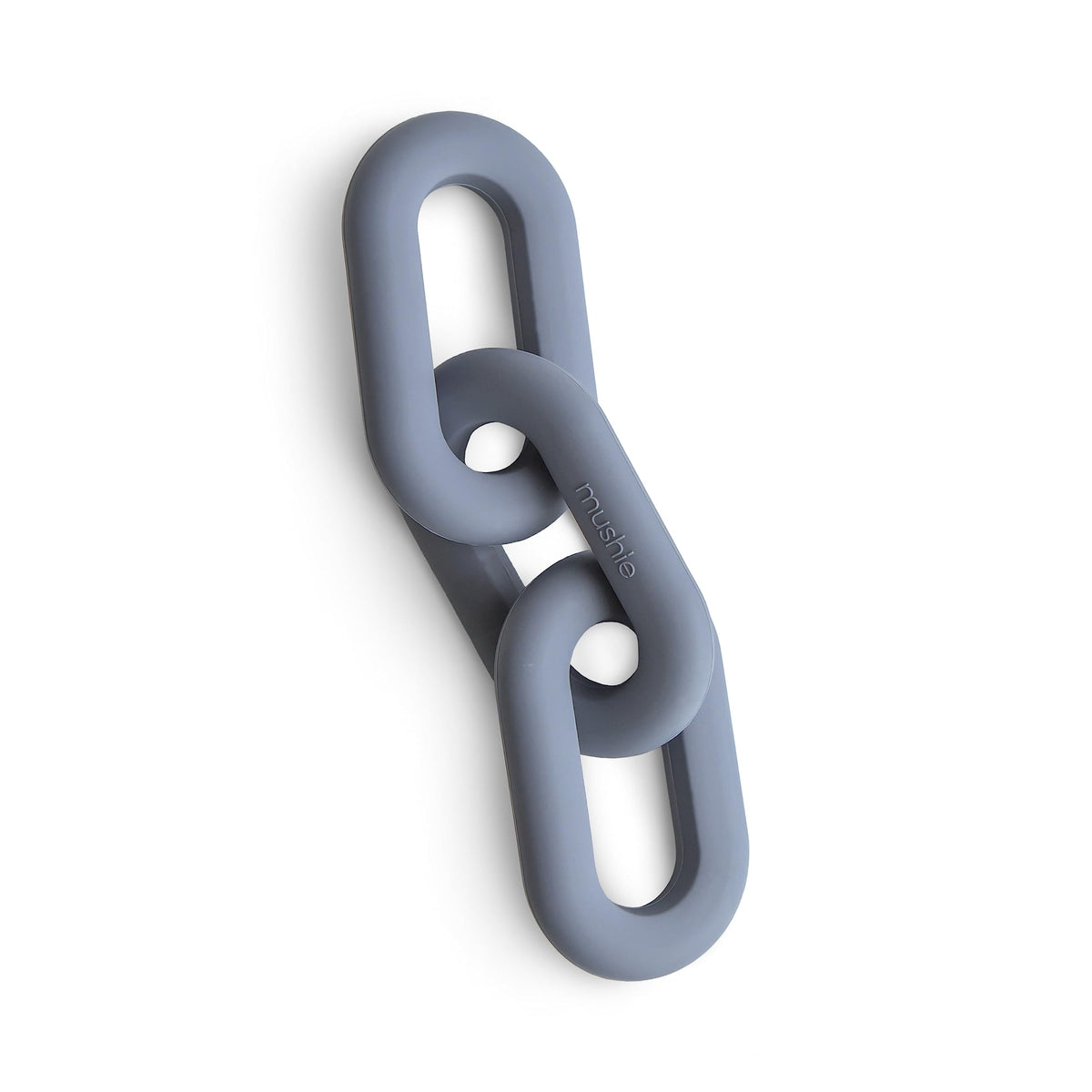 Mushie silicone baby links teether Tradewinds assembly provides gentle early-teething comfort.