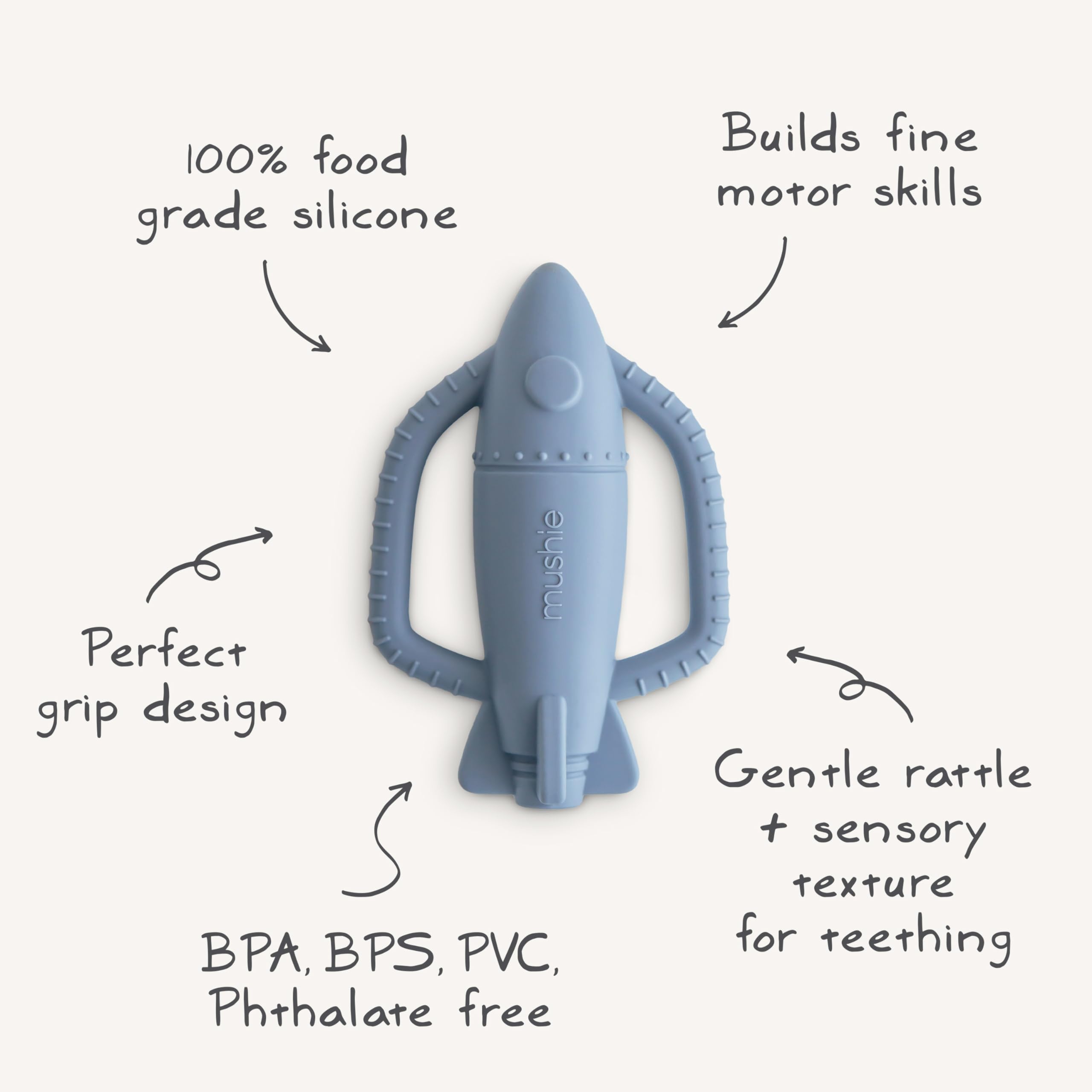 Mushie rocket rattle teether in use during playtime with baby