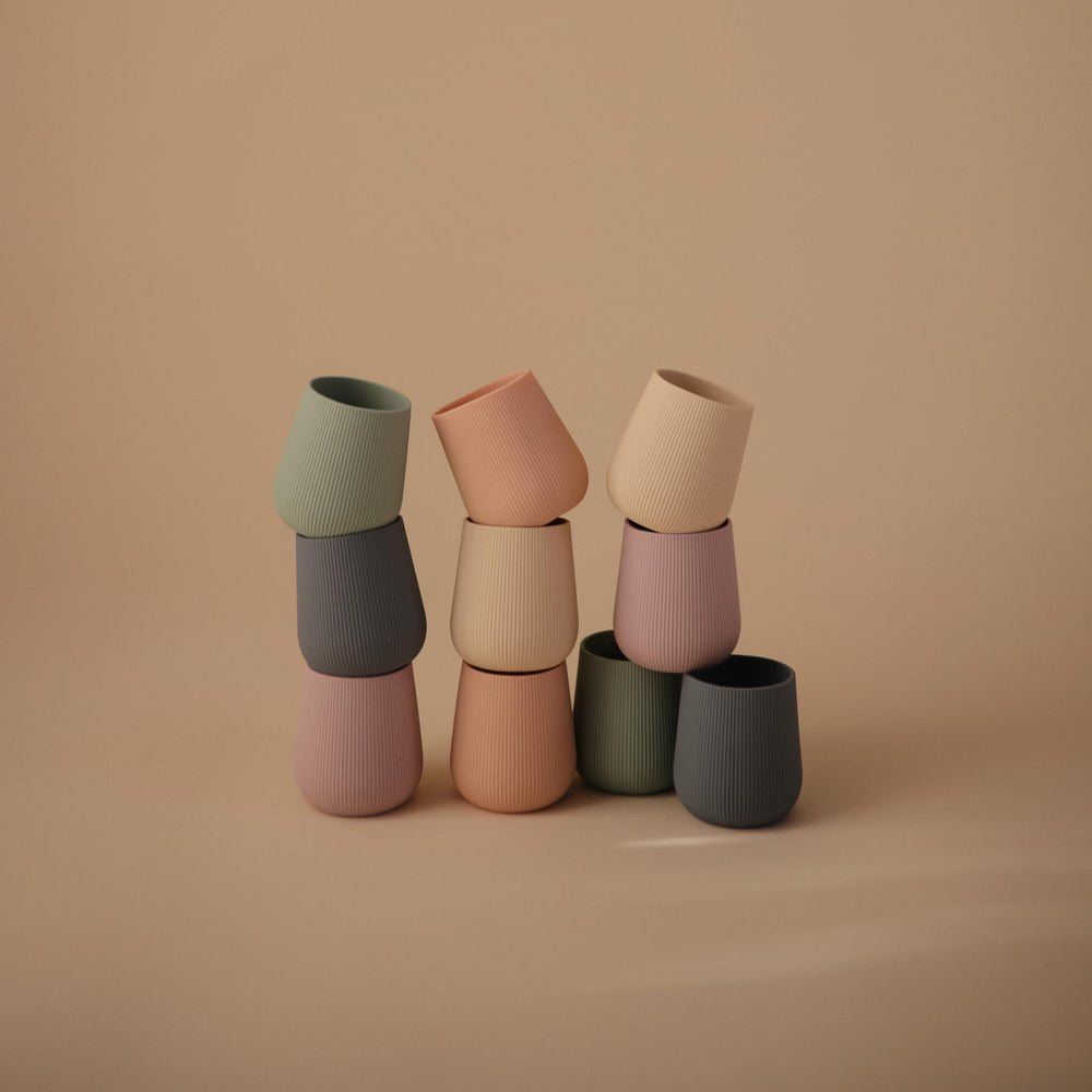 Mushie design emphasizes calm parenting with safe, practical baby gear.