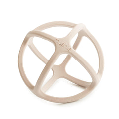 Mushie silicone baby teether ball Shifting Sand closeup soothes teething gums