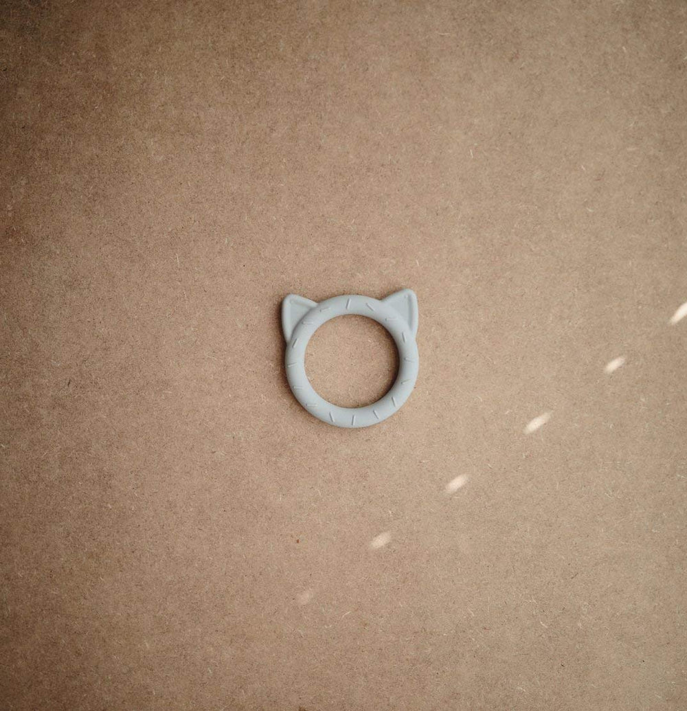 mushie cat stone teether close-up texture highlights chew-friendly silicone for soothing relief