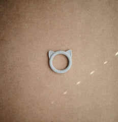 mushie cat stone teether close-up texture highlights chew-friendly silicone for soothing relief