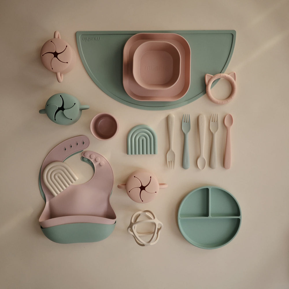 Mushie teether rainbow mauve in nursery — easy to clean after use