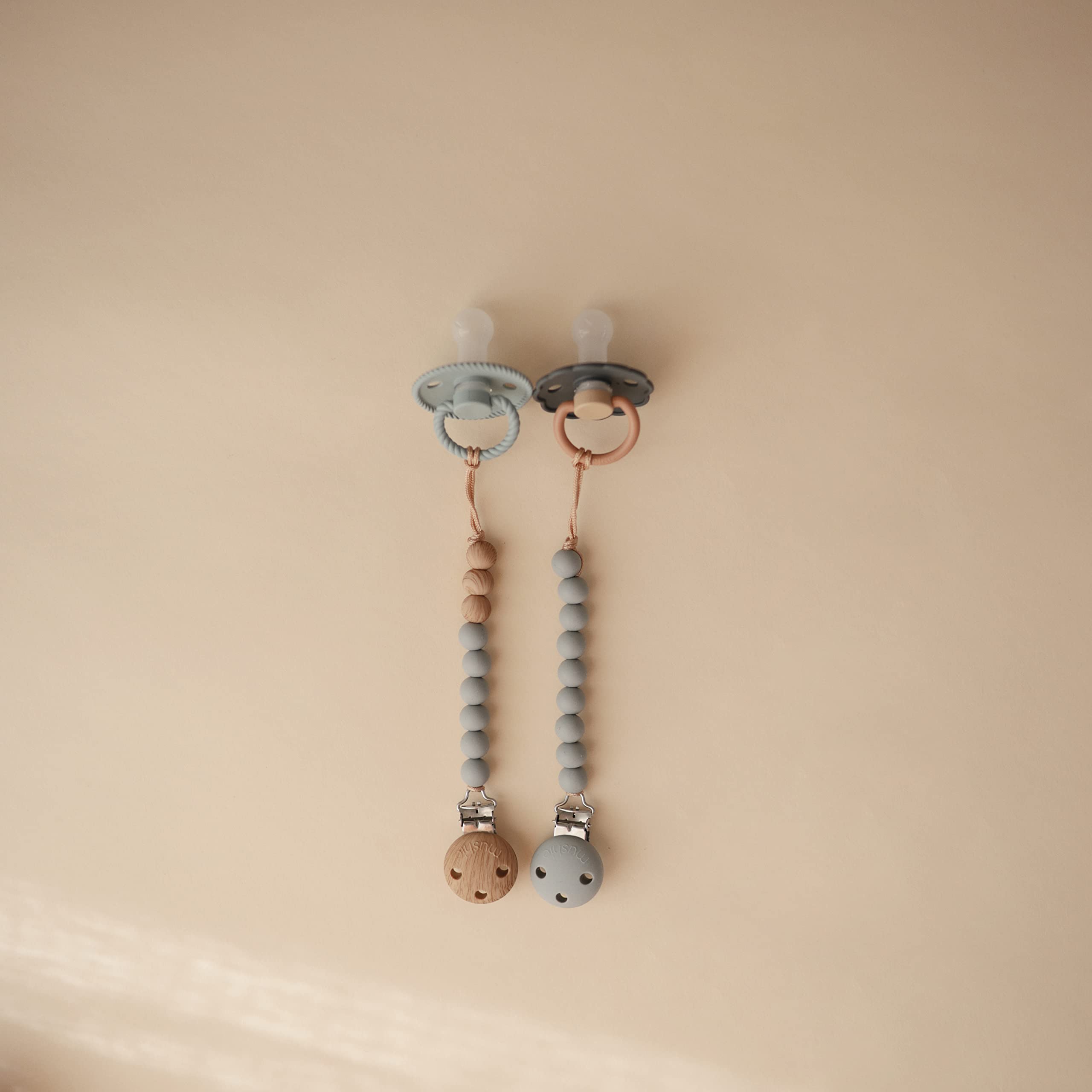 Mushie silicone bead stack in soft colors offers gentle, appealing infant accessory styling