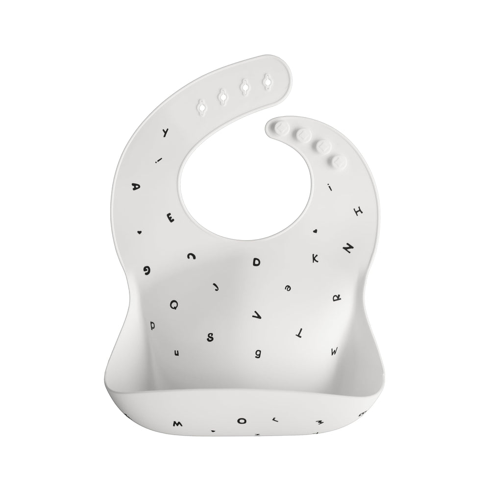 Mushie silicone bib with adjustable neck for growing babies during meals