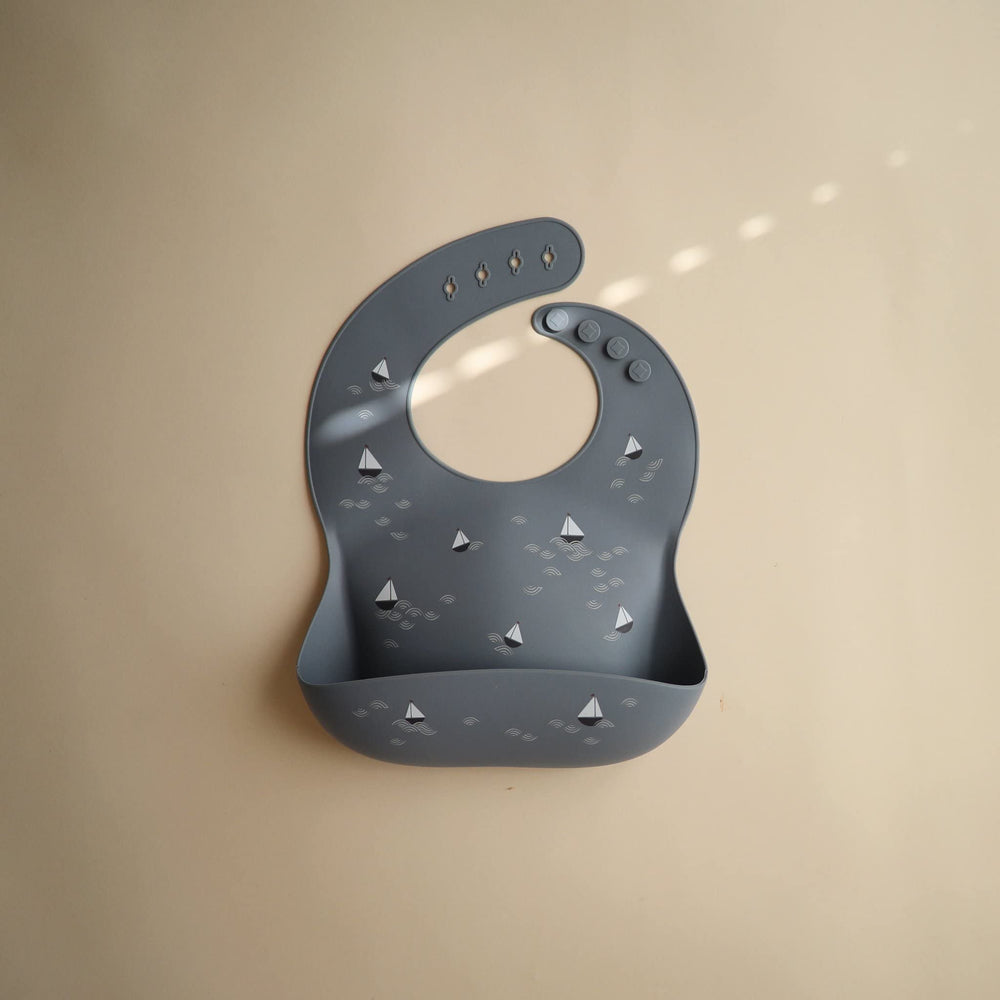 Mushie silicone bib made in Sweden emphasizes calm design and functional style.