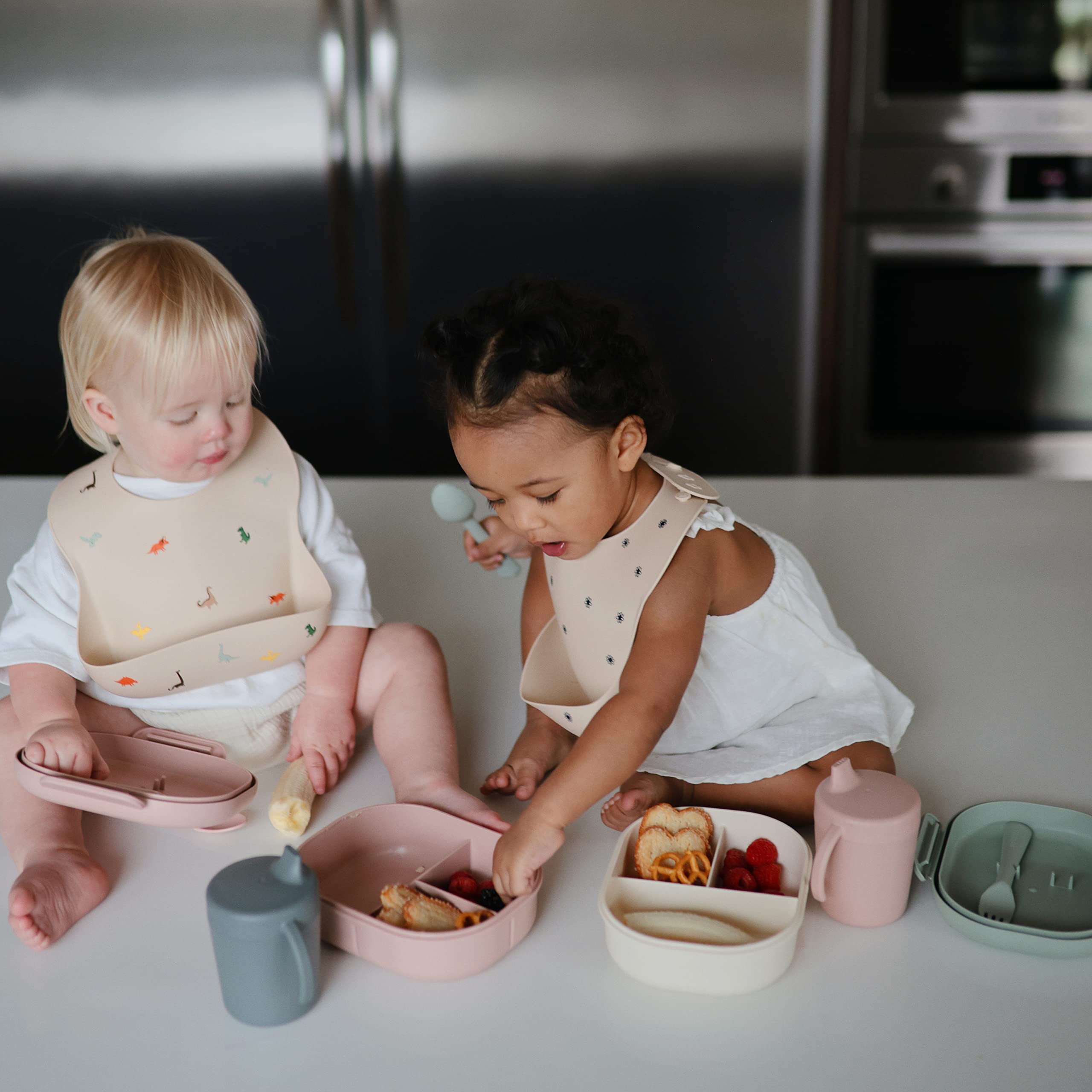 Mushie silicone bib wipes clean and dries quickly after meals