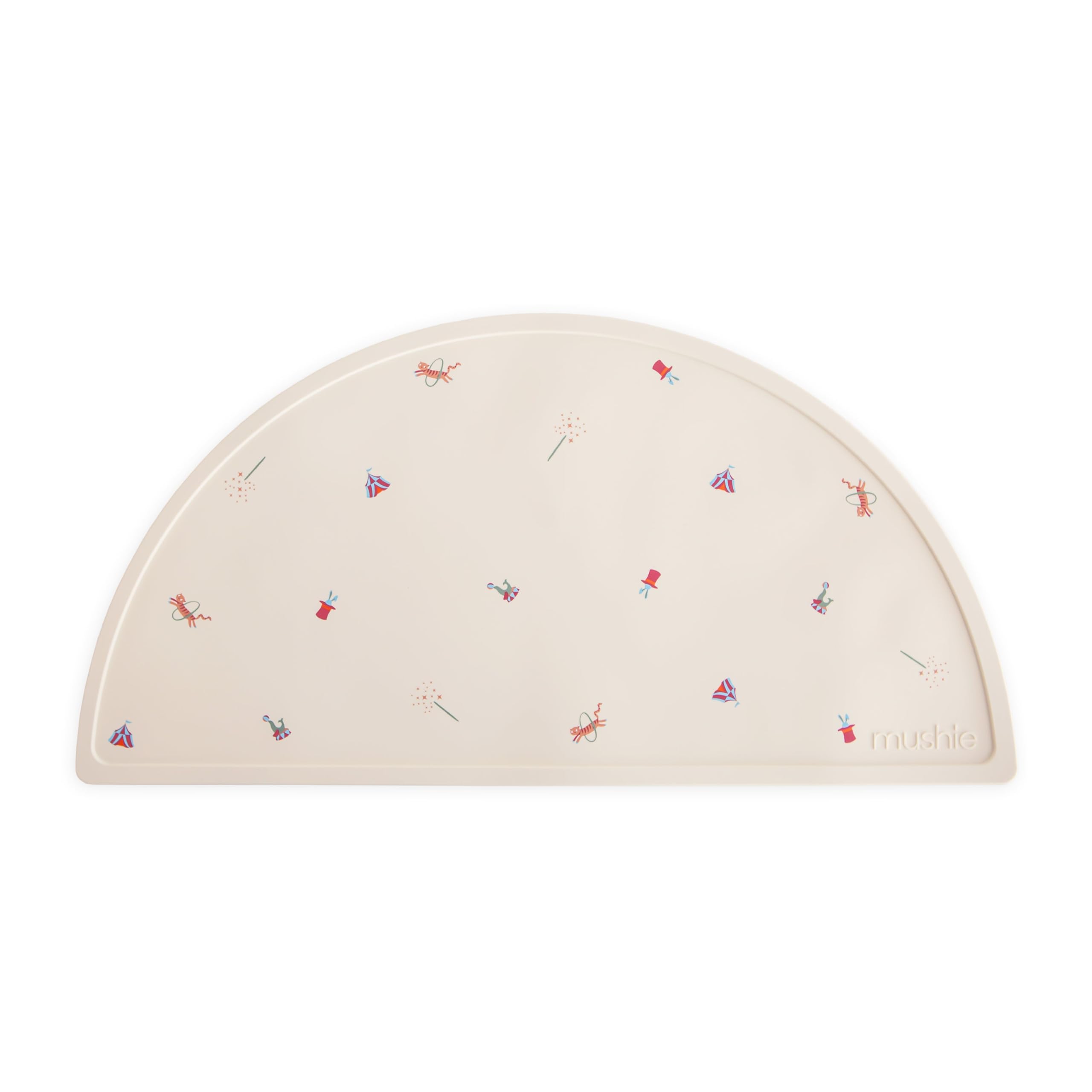 Mushie silicone placemat circus-pattern keeps meals tidy and colorful.