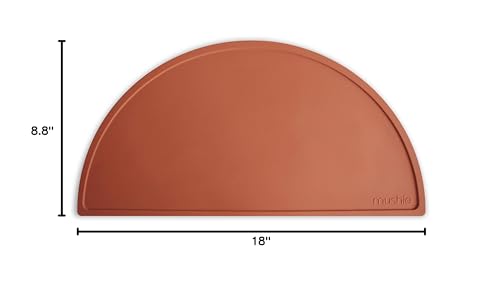 Mushie silicone placemat clay kid-friendly design promotes focused moments at mealtime.