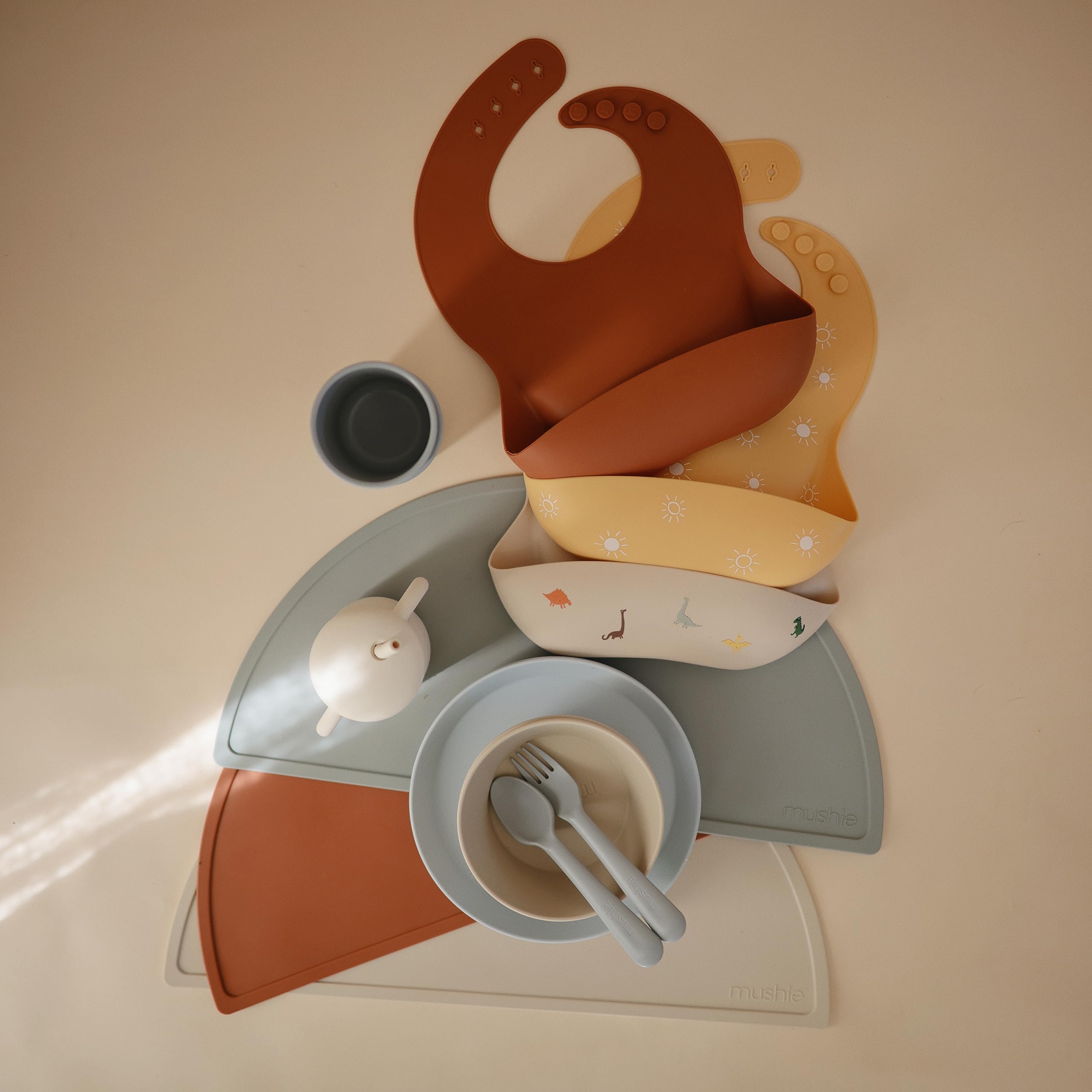 Mushie silicone placemat clay designed in Sweden for timeless, elegant mealtime aesthetics.