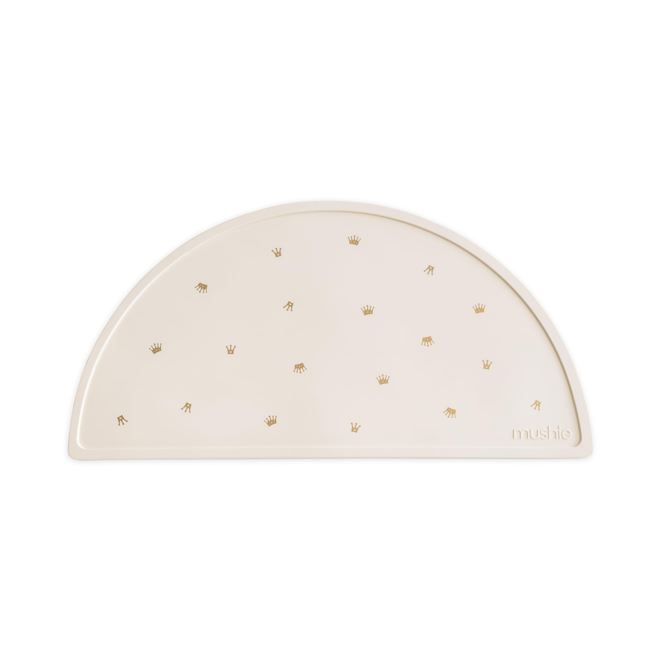 Mushie silicone placemat crowns closeup demonstrates non-slip edge for mess-free meals.