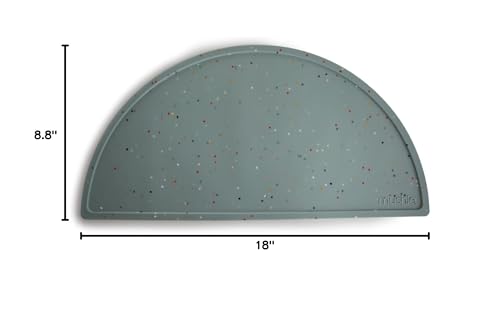 Mushie dining room scene featuring Cambridge Blue Confetti placemat