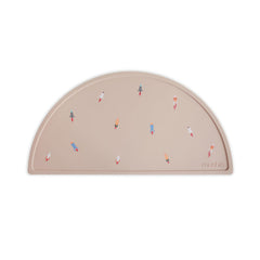 Mushie silicone placemat rocket ship design grips tray to reduce mess during meals