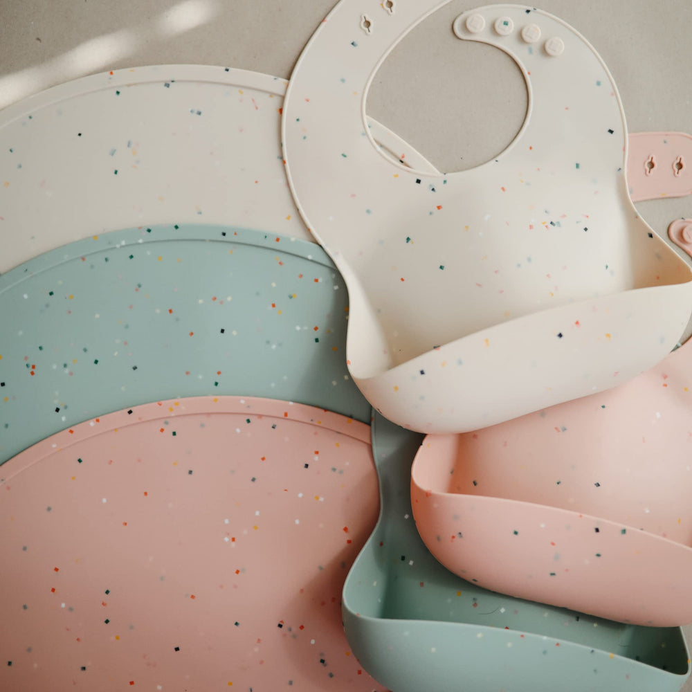 Mushie Vanilla Confetti pattern adds timeless style to mealtime setups
