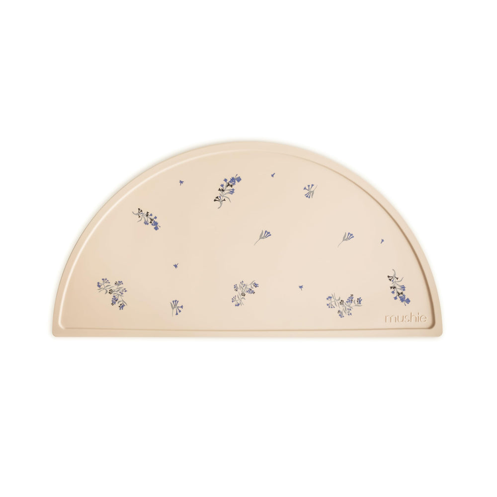 Mushie silicone placemat Lilac Flowers front view shows non-slip surface for mess-free meals.