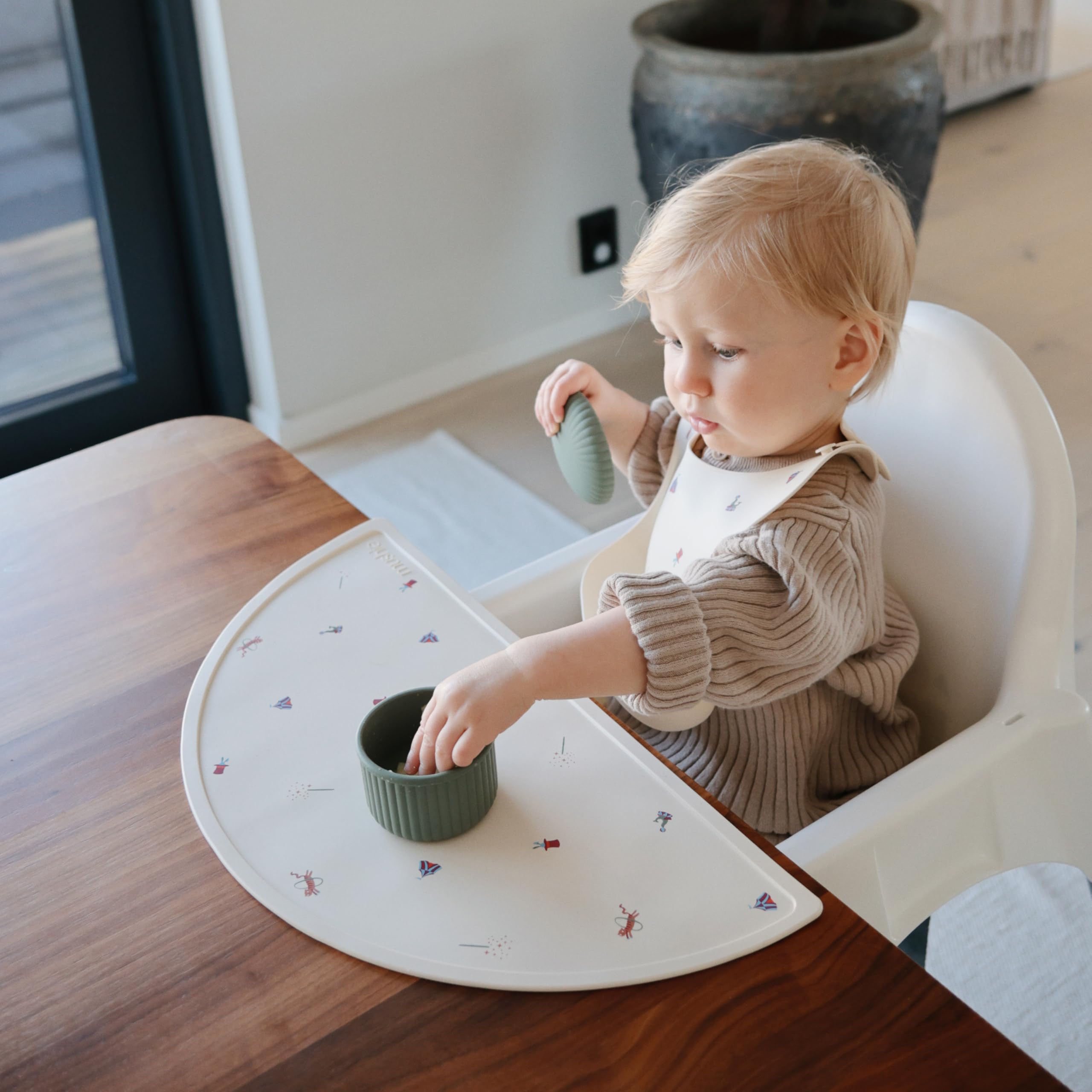 Mushie silicone placemat mealtime-moments supports organized, calm dining for kids.