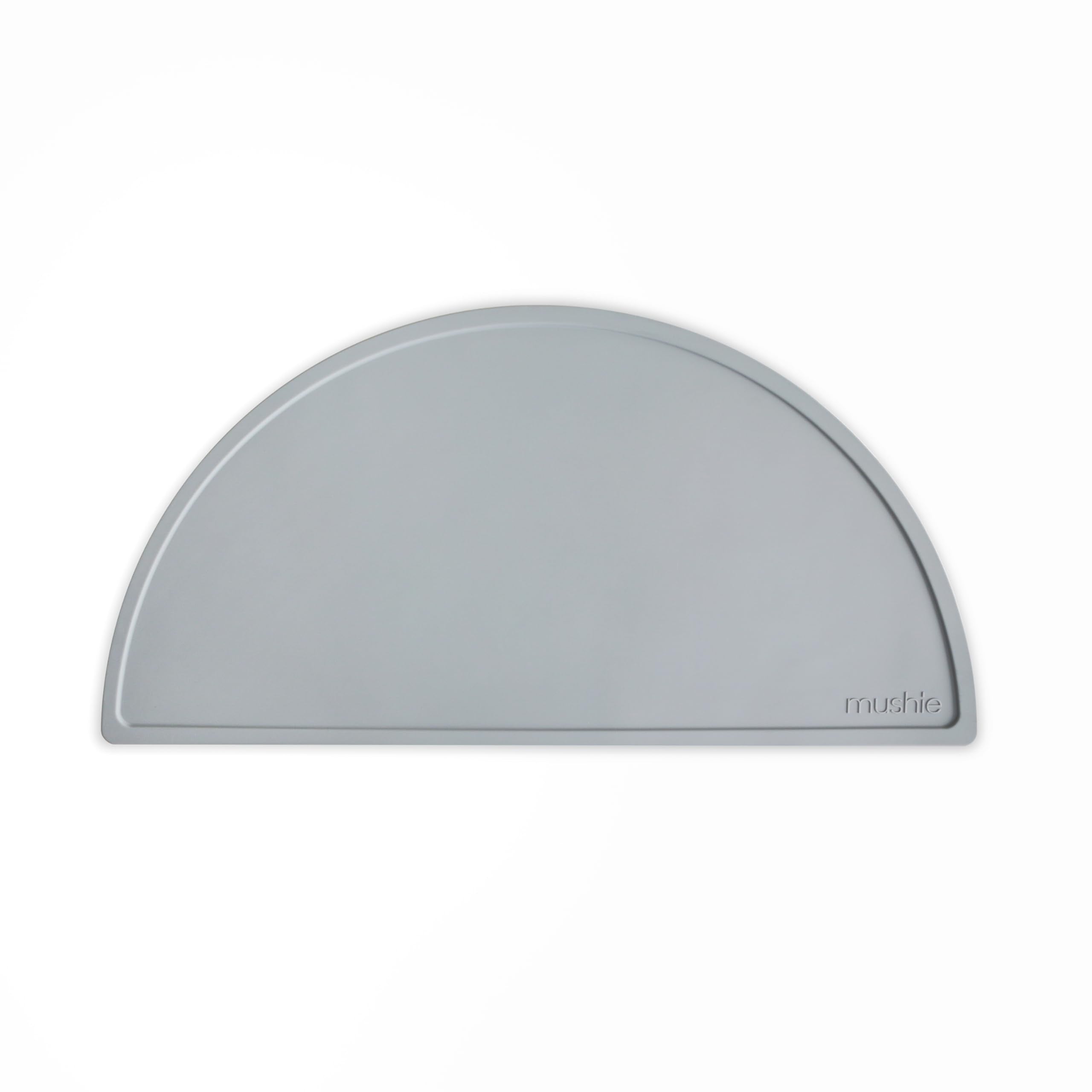 Mushie silicone placemat stone angle showcases non-slip surface for mess-free mealtimes.