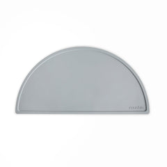 Mushie silicone placemat stone angle showcases non-slip surface for mess-free mealtimes.