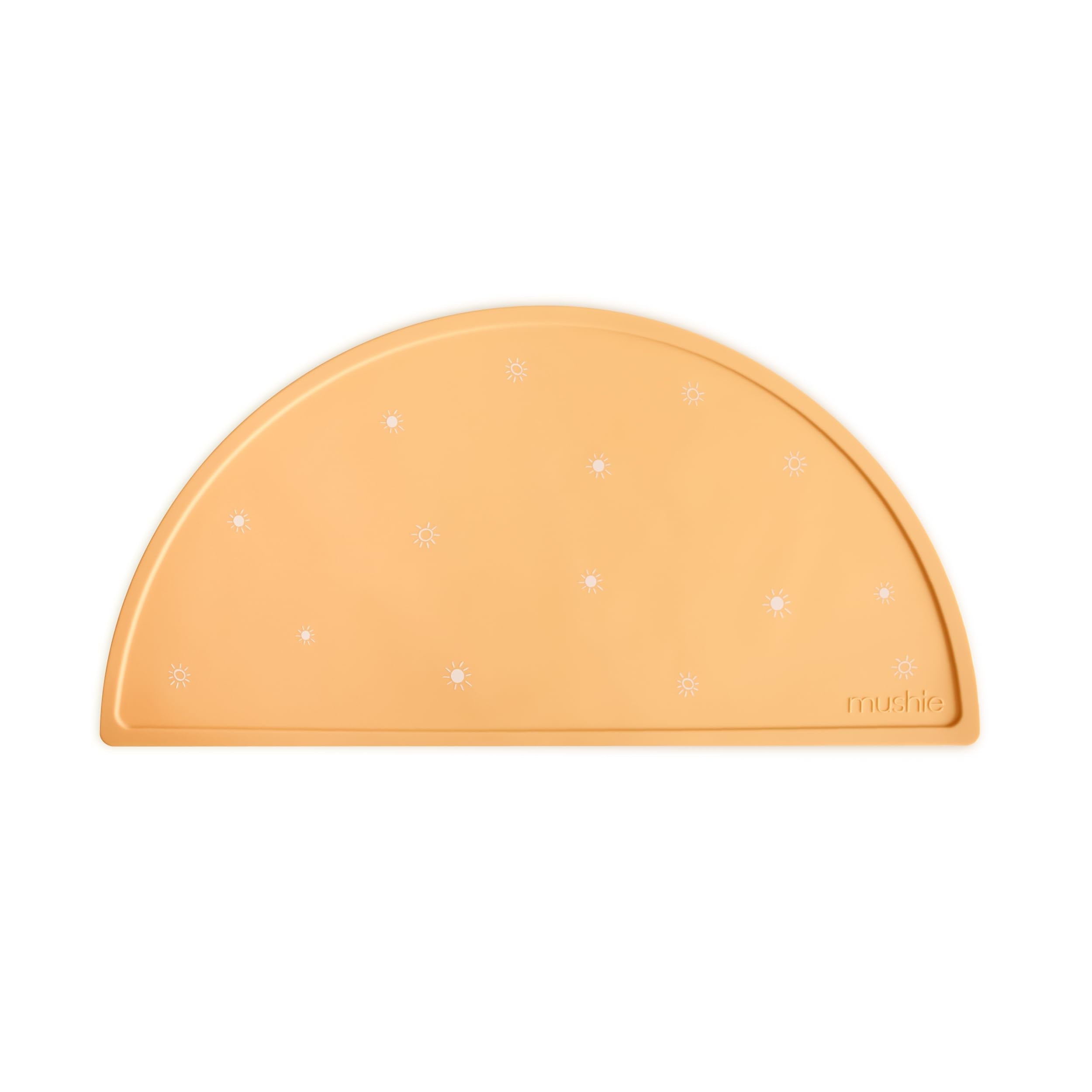 Mushie Sun Orange placemat on table for mess-free meals