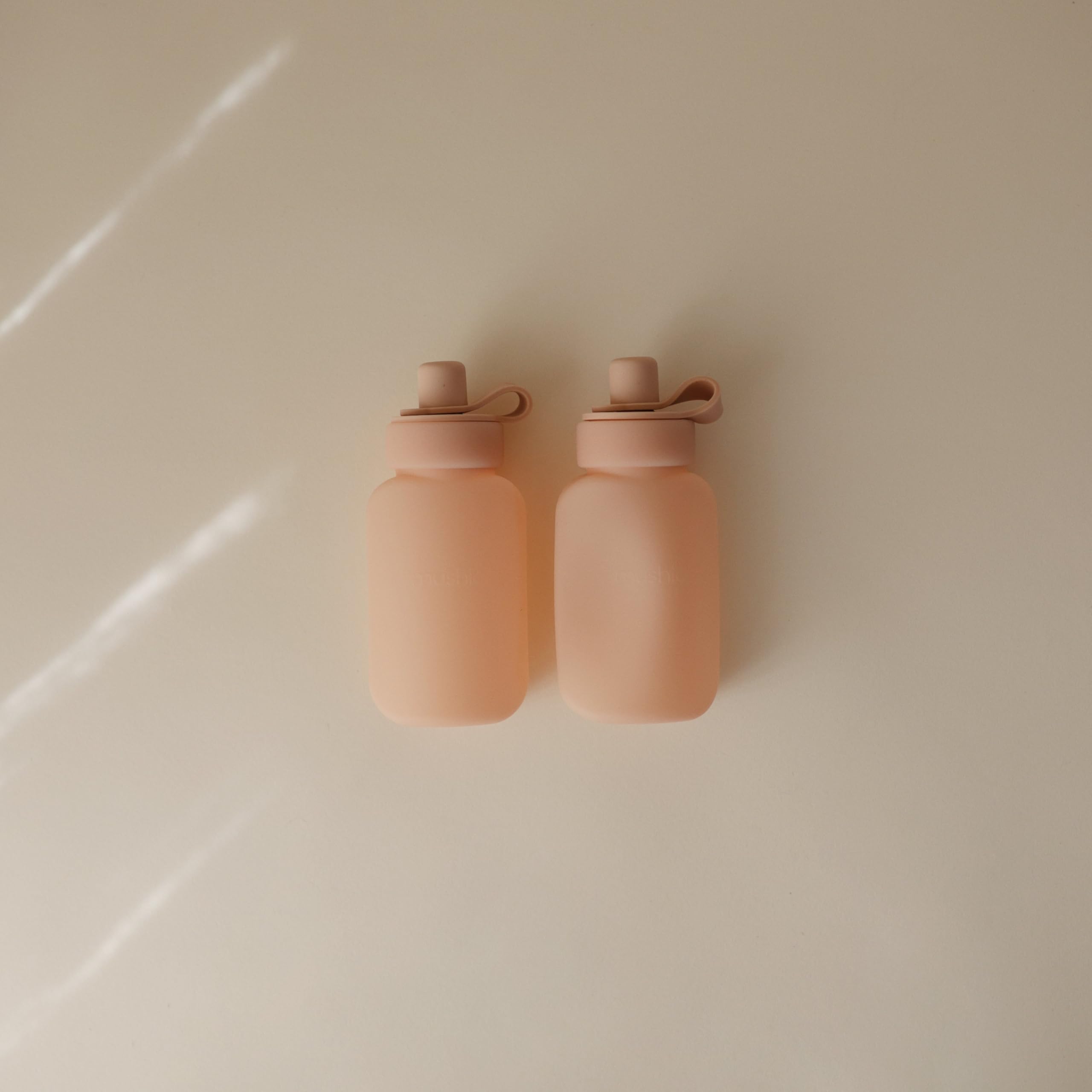 Mushie puree pouch filled, showing easy portion control for baby meals.