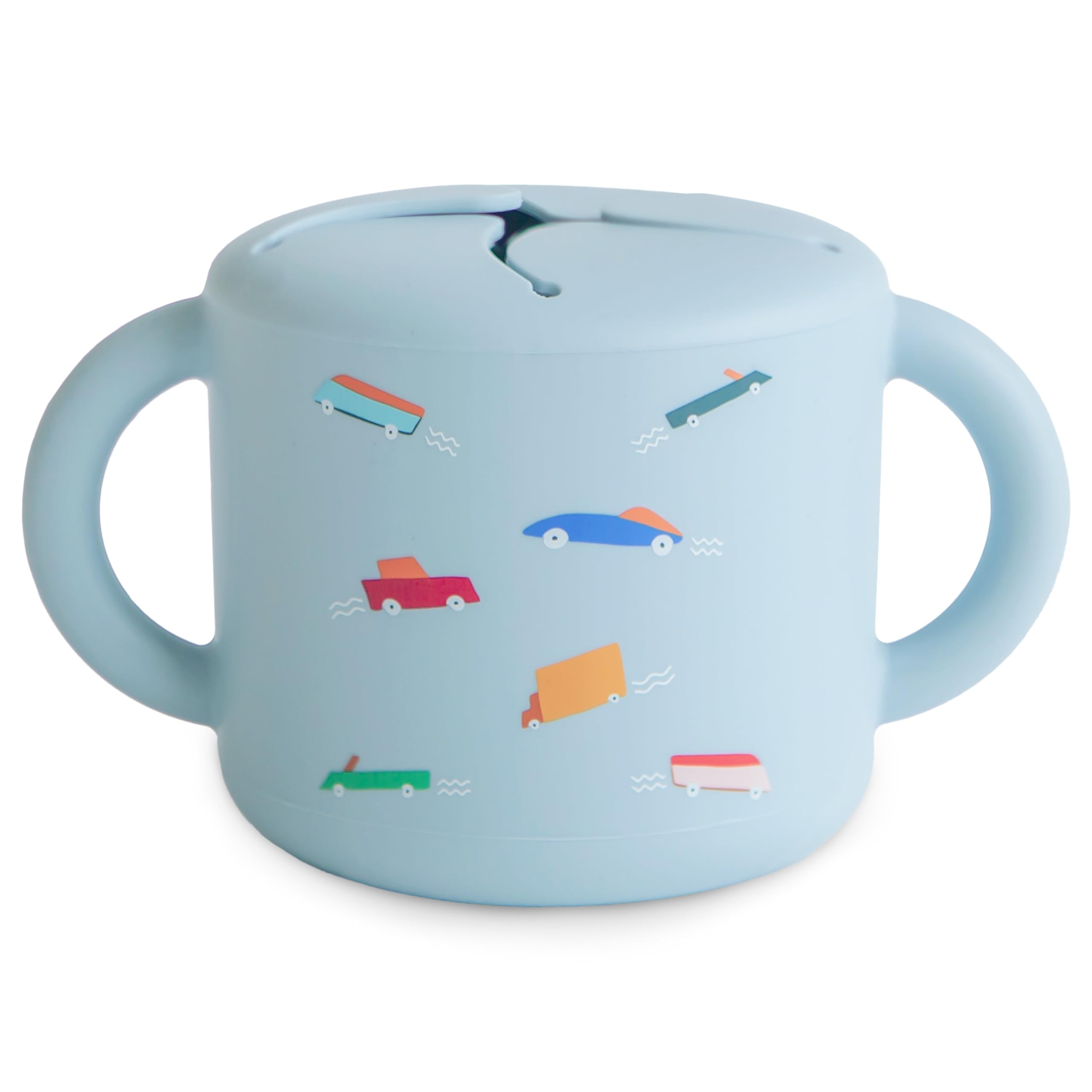 Mushie silicone snack cup with two handles, easy grip for toddlers on the go.