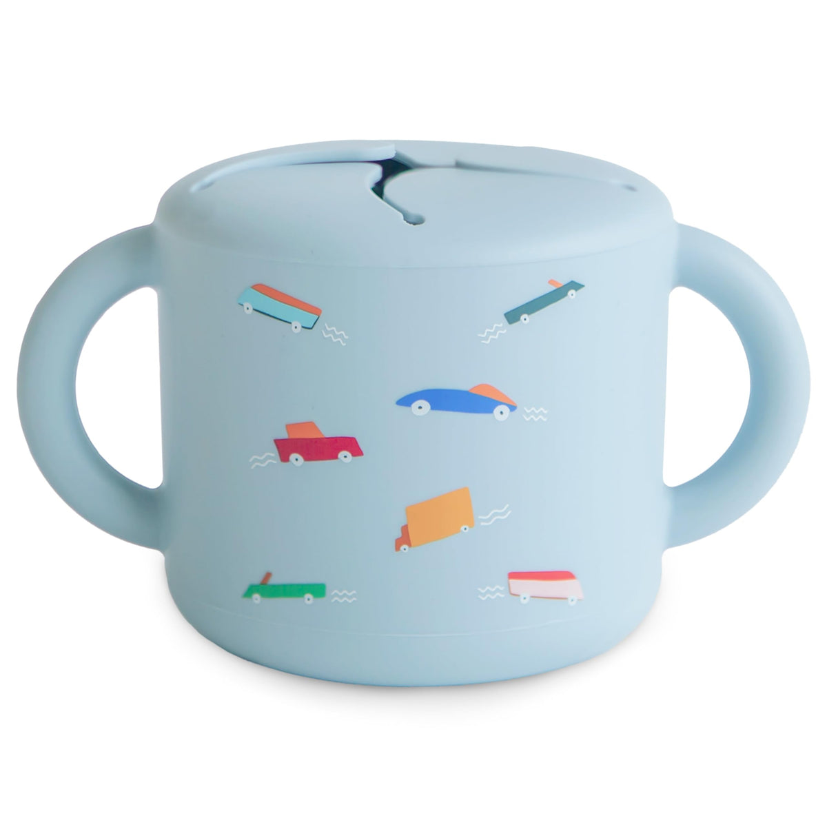 Mushie silicone snack cup with two handles, easy grip for toddlers on the go.